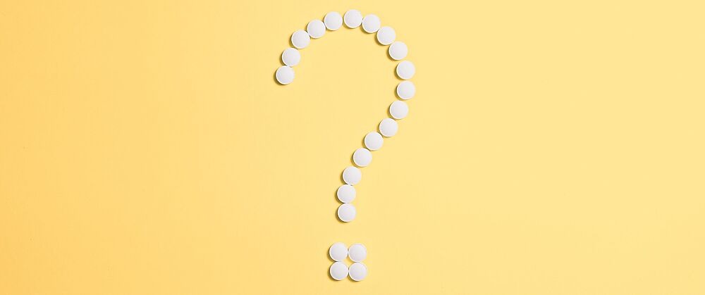 Fragezeichen aus Pillen/Tabletten